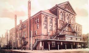 The exterior of Massey Hall showing a canopy, built in 1911 that ran along the front of the theatre.